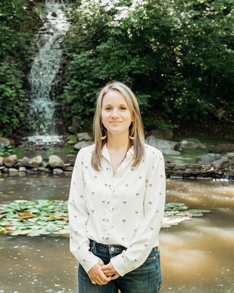 carolyn in front of waterfall